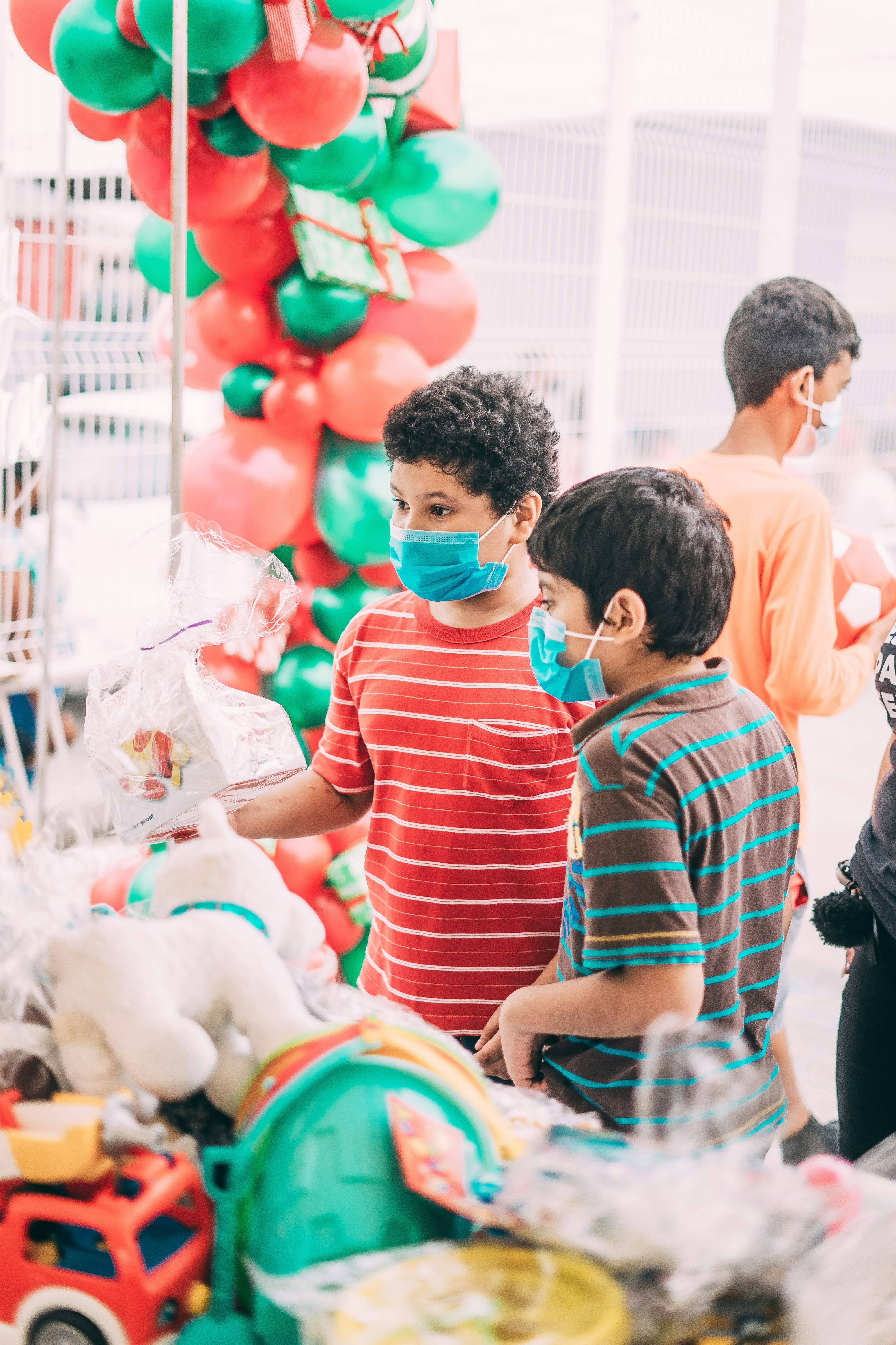 Volunteer distributing supplies to families