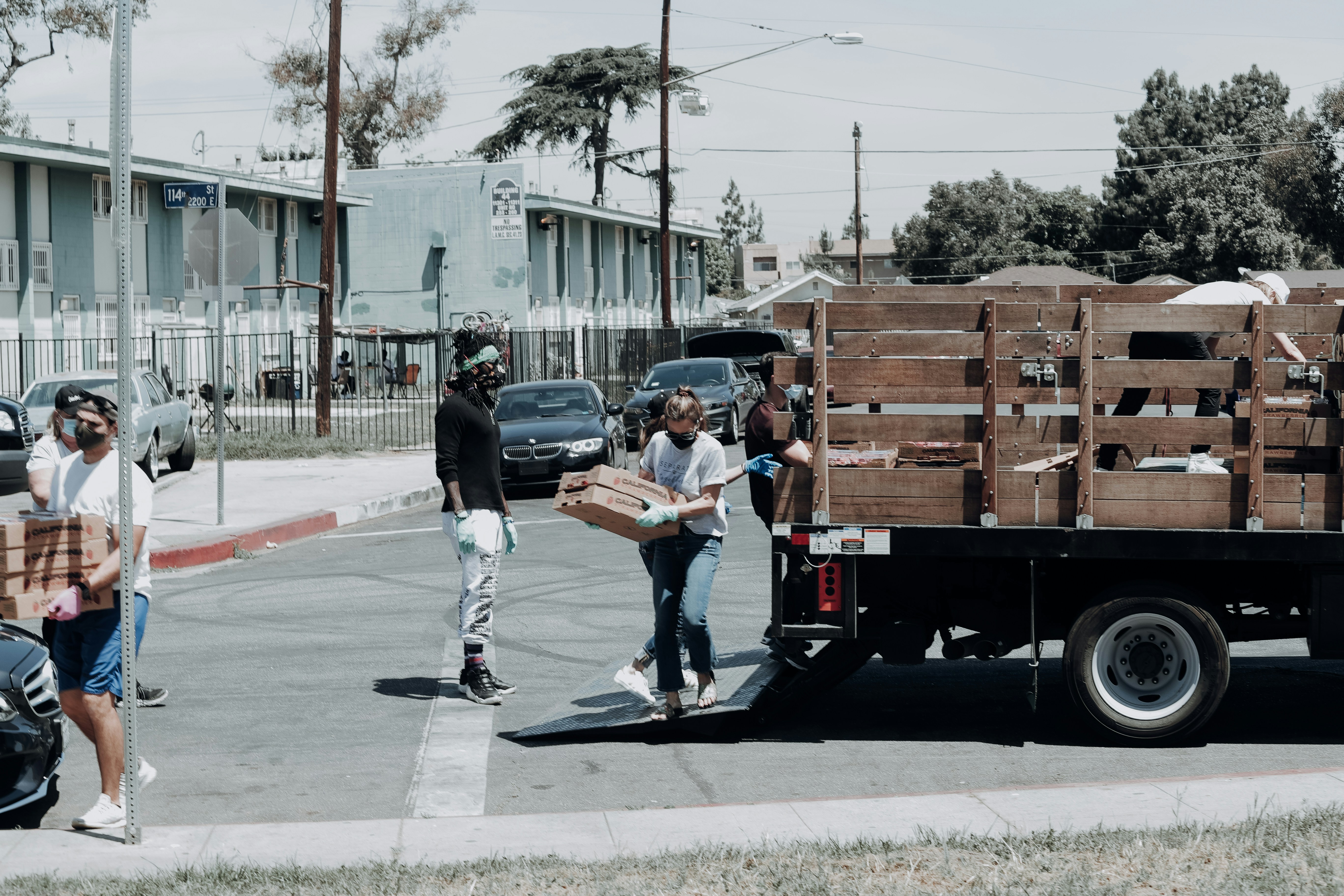 Team loading supplies into a delivery vehicle